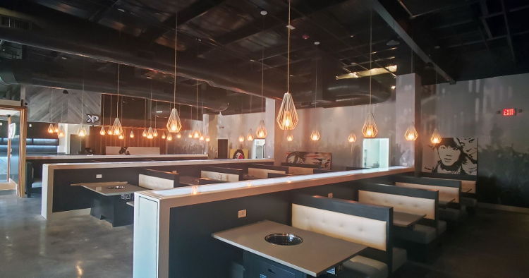A branch of KPOP, a Korean barbecue restaurant, has a stylish new look thanks to over 6,200 sq. ft of wall graphics printed on Drytac ReTac by High Stakes Creative.